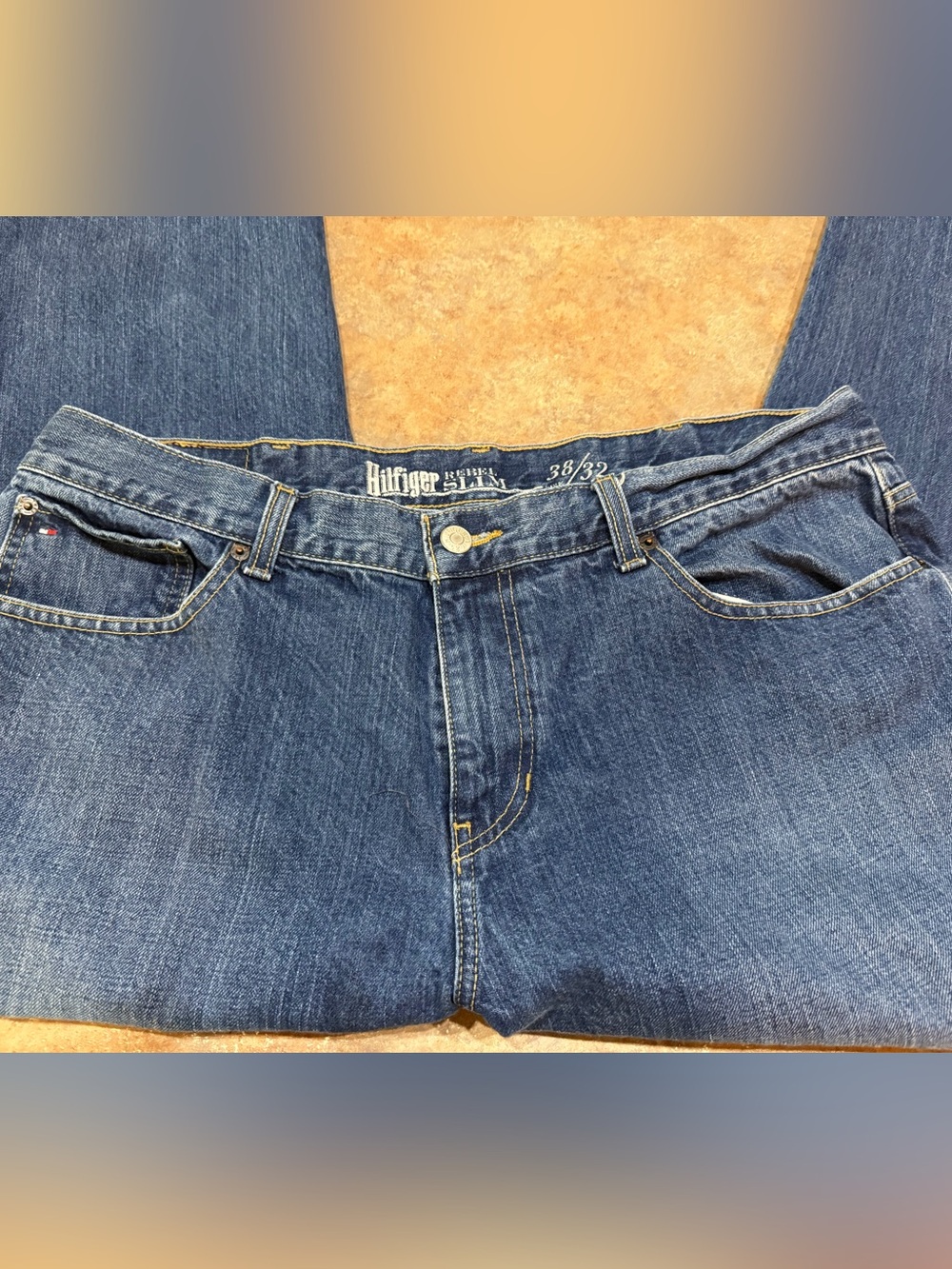 Tommy Hilfiger Rebel Slim men's blue denim jeans in a size 38/32